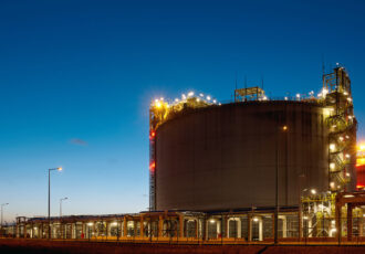 Liquified Natural Gas tank at dusk