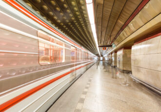 Motion blur of train going through metro tunnel
